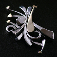 Brosche Unique aus Silber 950 und Gelbgold 585